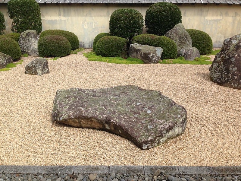 A large piece of boulder can be a landscaping centerpiece as well.