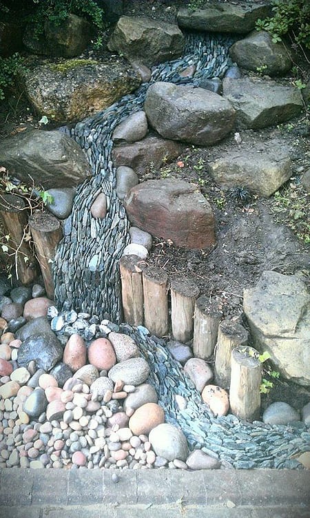 Dry river bed landscaping ideas: waterfall effect using stones