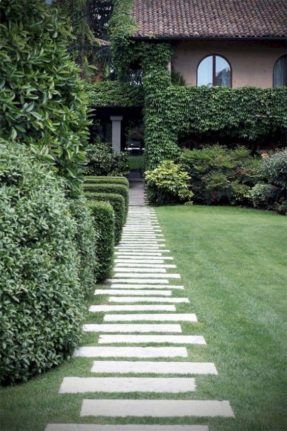 concrete pavers on top of the grass as a garden walkway  #walkway #Hardscaping #backyardLandscaping #backyardLandscapingIdeas #landscaping #cheapLandscapingIdeas #backyard #landscaping #curbAppeal  #steppingStones