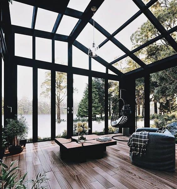 Patio with a glass roof and wall  #patioideas #patiodeck #outdoorSpace #outdoordecor #patiodecor #patio #outdoorliving #outdoorFurniture#pavillion #pavilion
