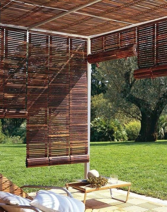 patio with wood blinds  as an enclosure  #patioideas #patiodeck #outdoorSpace #outdoordecor #patiodecor #patio #outdoorliving #outdoorFurniture#outdoorShade