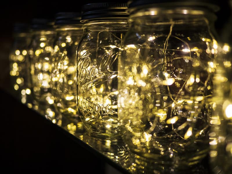 Mason Jars decorated with string lights