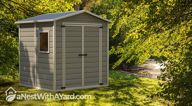 Gray color gardening tools storage shed on nature green background