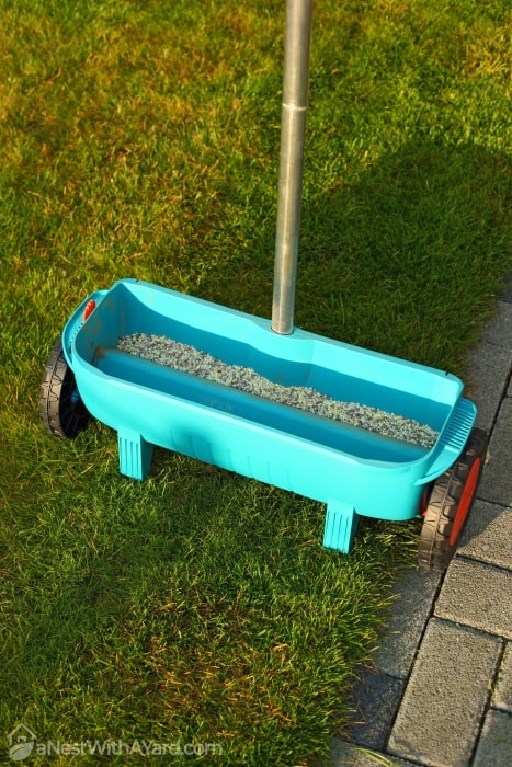 Fertilizer on a light blue color wheeled container