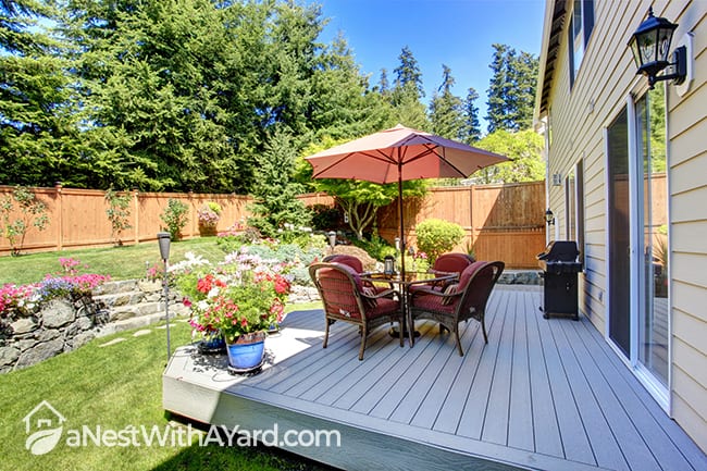 Beautiful backyard landscape backyard design with vibrant veranda on a walkout deck