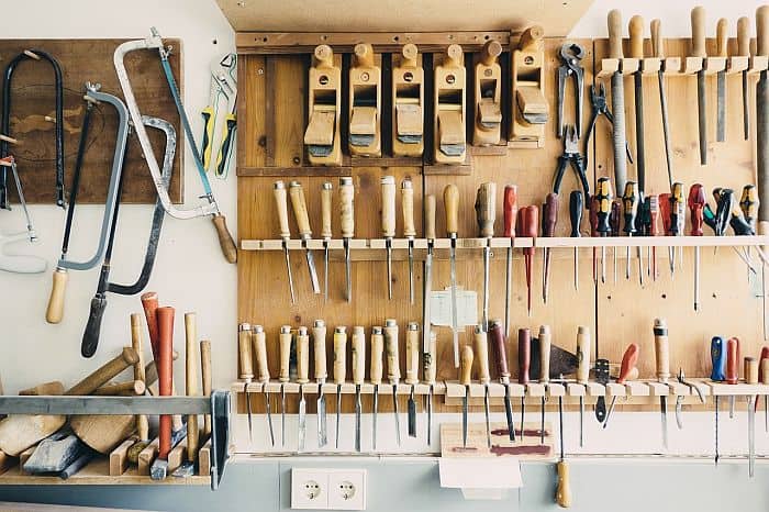Different set of tools hanging on Tool Shelf