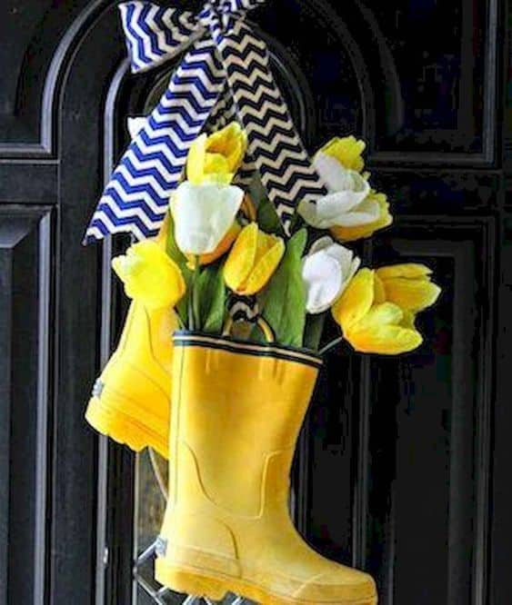 Raiboots as a perfect Easter vase #easter #backyardporch #porchIdeas #frontDoorDecor